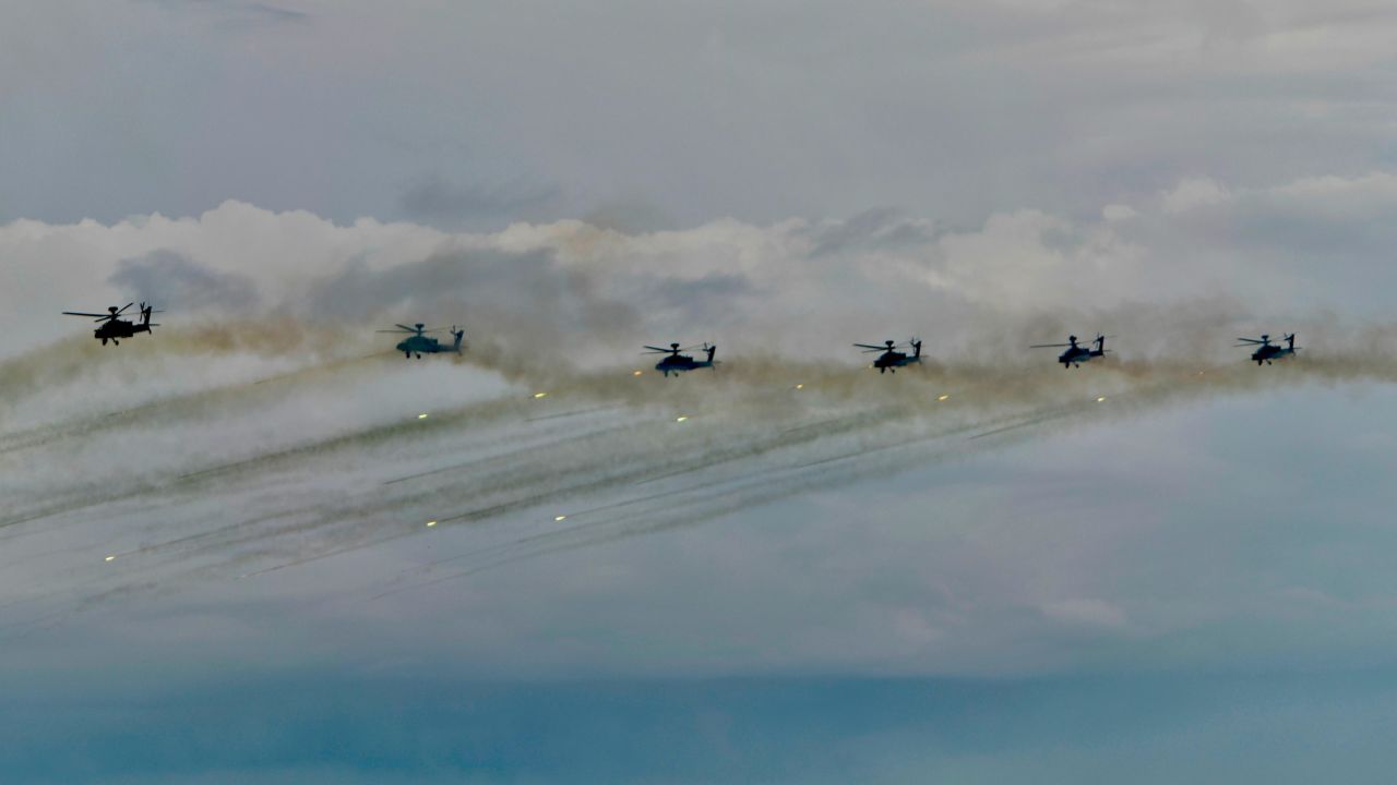 US-made AH-64E Apache attack helicopters take part in the annual Han Kuang military drills in Taichung on July 16.