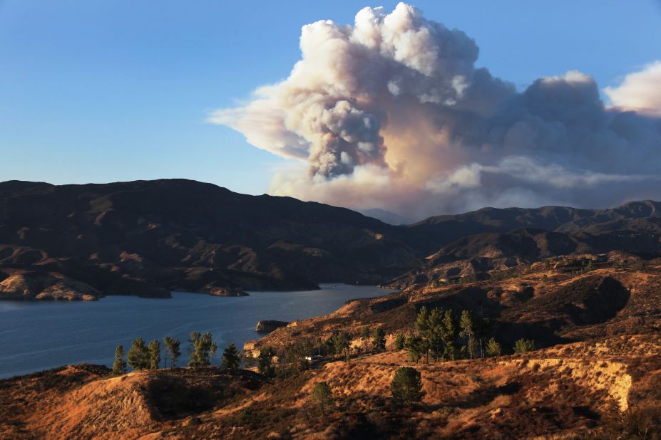 A plume of smoke rises from the Lake Fire on August 12, 2020.