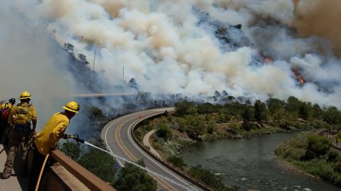 Firefighters battle the Grizzly Creek fire in Colorado on Monday, August 10.