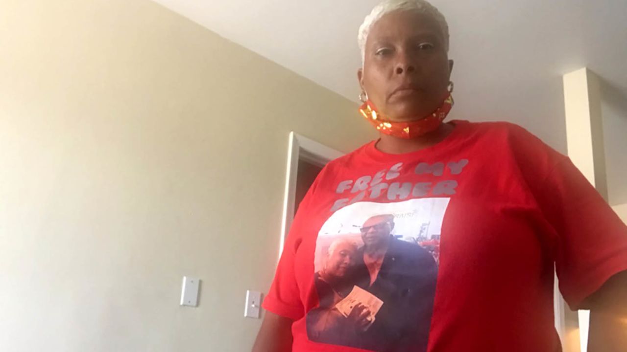 Rashawnda Littles wears a T-shirt depicting her and her father.