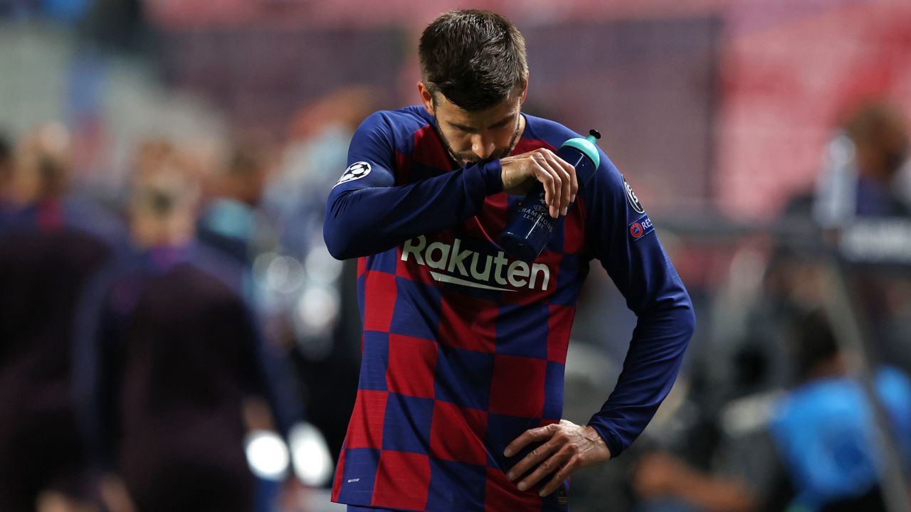 Pique reacts following defeat to Bayern.