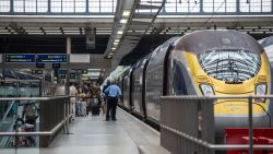 Passengers leave the first Eurostar train to arrive at St Pancras Station, London from France after new quarantine restrictions came into effect on the morning of August 15, 2020.