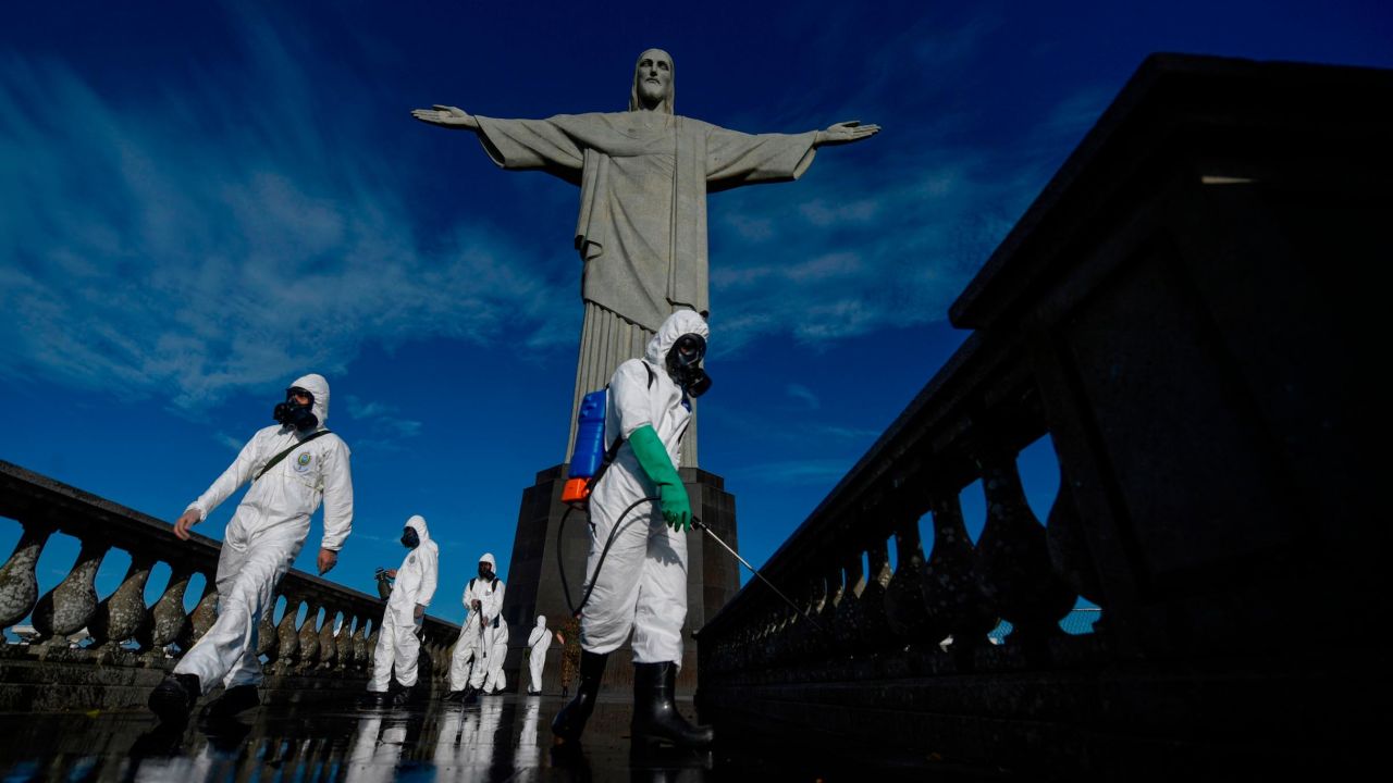 Brazilian soldiers disinfect the area around the Christ The Redeemer statue in Rio de Janeiro, Brazil, on Thursday, two days ahead of its reopening. 