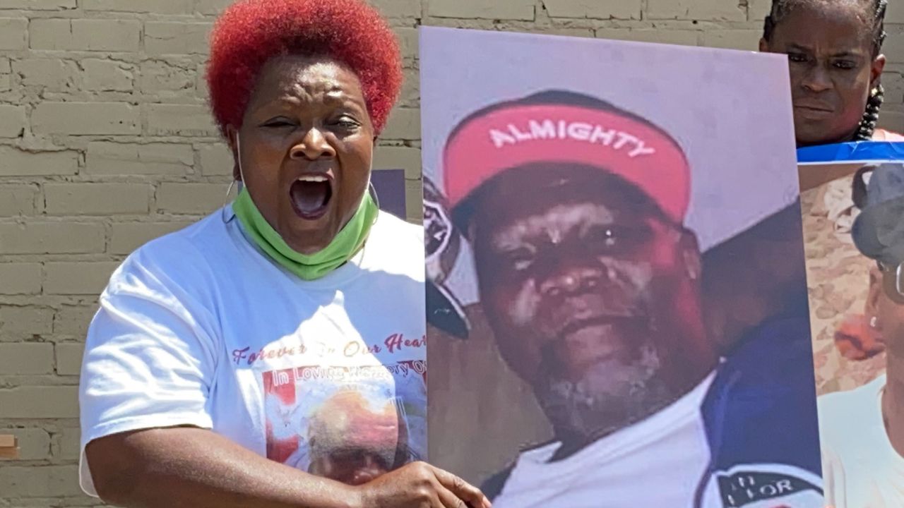 Robinson's sister Bettersten Wade calls for justice for her late brother at a news conference in Jackson on June 9, 2020.