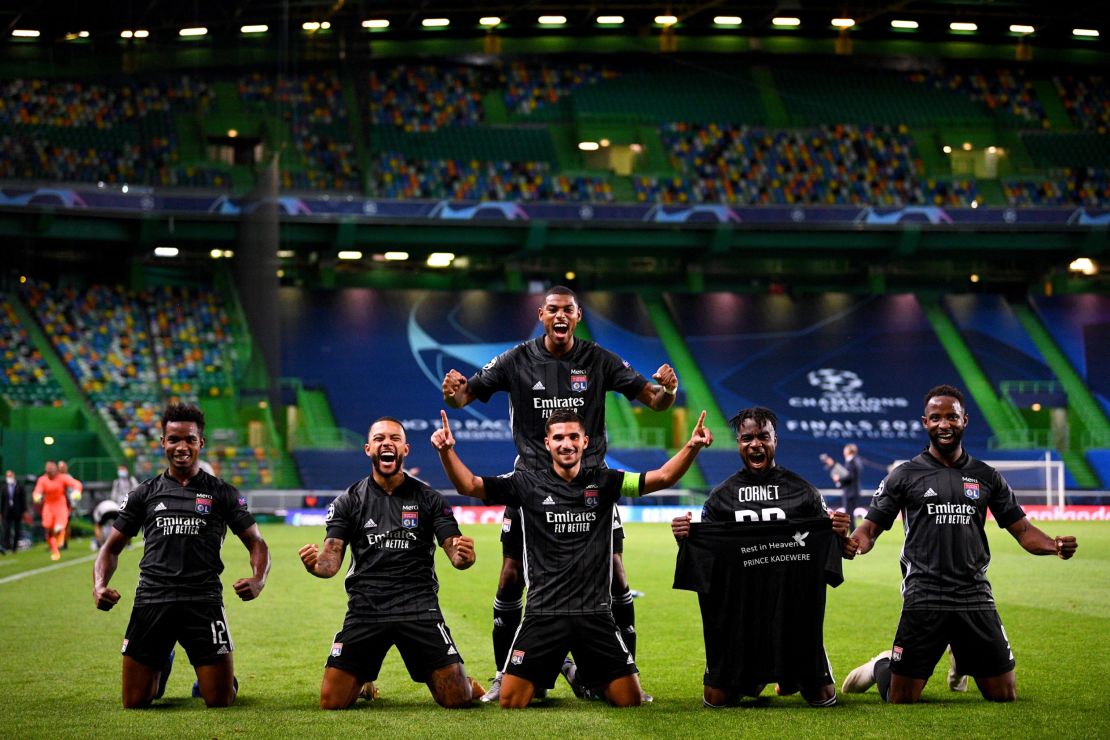 Lyon players celebrate following the team's victory over Manchester City on Saturday, August 15.