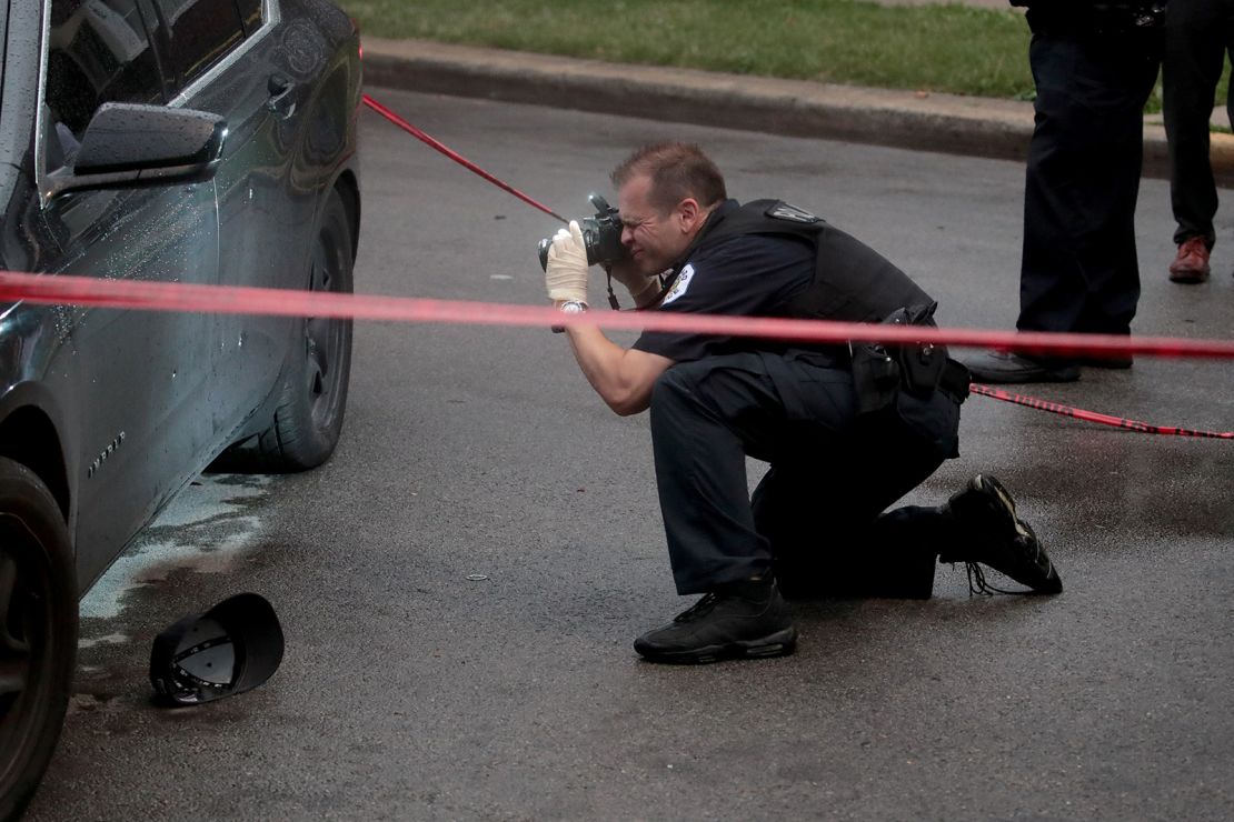 Police investigate the scene of a shooting in Chicago on July 21, 2020. Homicides in the city are up 33% in the first three months of the year compared to 2020, while shootings are up nearly 40% for the same period year-over-year. 