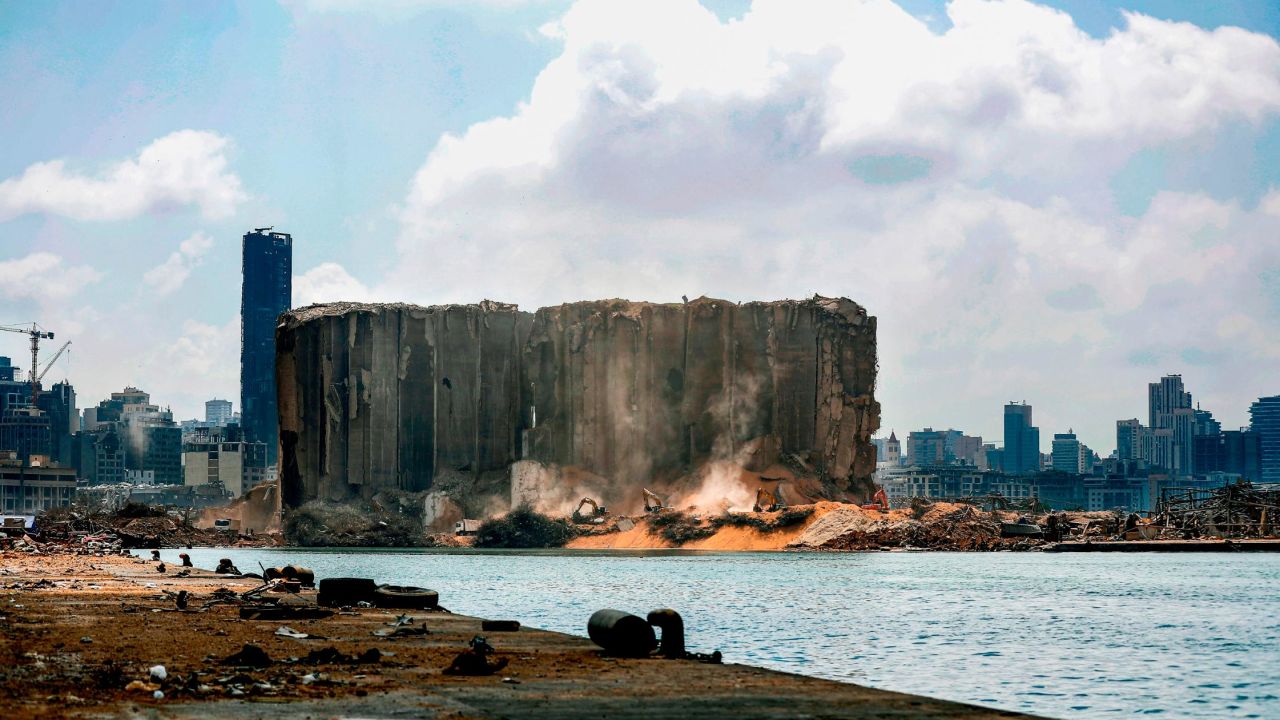 Diggers are shown moving earth at the port of Beirut on August 14, 2020, following the massive explosion there earlier in the month.