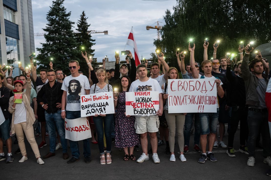 Protesters demonstrate against presidential election results outside Belarusian state TV headquarters in Minsk on August 15, 2020.