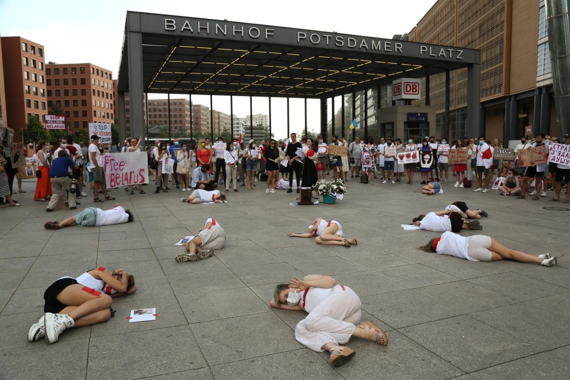 Demonstrators stage a "die-in" as part of protests against the results of Belarus' presidential election in Berlin, Germany on August 15, 2020. 