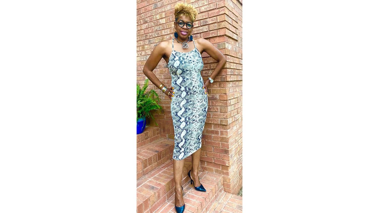 Sharp modeling her boutique's outfits.