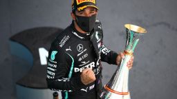 Mercedes' British driver Lewis Hamilton celebrates on the podium after the Spanish Formula One Grand Prix at the Circuit de Catalunya in Montmelo near Barcelona, on August 16, 2020. (Photo by Bryn Lennon / POOL / AFP) (Photo by BRYN LENNON/POOL/AFP via Getty Images)