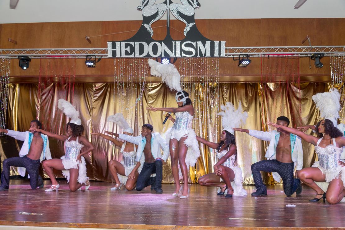 Performers at Hedonism II, seen in a pre-pandemic photo, are now required to wear masks.