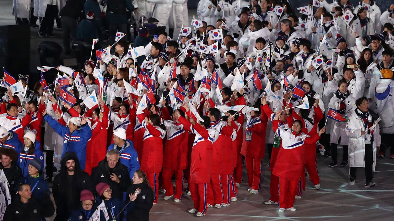 Team North Korea and Team South Korea walk together in the Parade of Athletes during the Closing Ceremony of the PyeongChang 2018 Winter Olympic Games.
