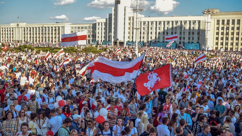 Belarus opposition supporters attend the rally in central Minsk on August 16, 2020. - The Belarusian strongman, who has ruled his ex-Soviet country with an iron grip since 1994, is under increasing pressure from the streets and abroad over his claim to have won re-election on August 9, with 80 percent of the vote. (Photo by Sergei GAPON / AFP) (Photo by SERGEI GAPON/AFP via Getty Images)