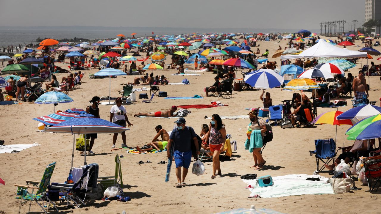 Visitors to Coney Island in New York soak up the sun and seek refuge from high temperatures during a July heatwave. According to the findings of a new study, New York is projected to see the greatest absolute increase in population exposure to extreme heat by 2100.