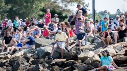 PLYMOUTH, MA - AUGUST 10:  Onlookers watch from the shore as The replica ship Mayflower II comes back into Plymouth Harbor after being rehabbed in Connecticut for the past three years on August 10, 2020 in Plymouth, Massachusetts. This year marks the 400th anniversary of the Pilgrims landing in Massachusetts. Festivites around the aniversary were scaled back due to the coronavirus pandemic. (Photo by Scott Eisen/Getty Images)