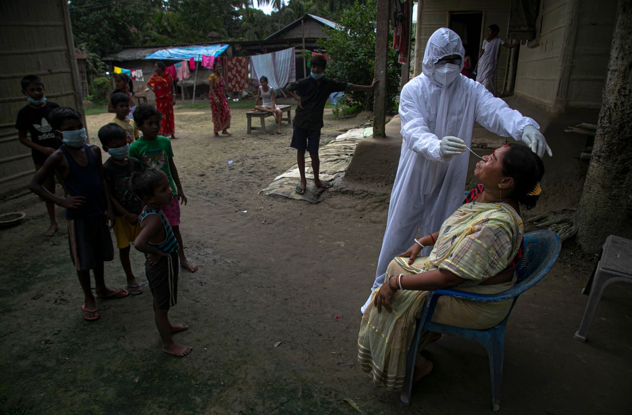 A health worker administers a Covid-19 test in the Indian village of Kusumpur on August 17.