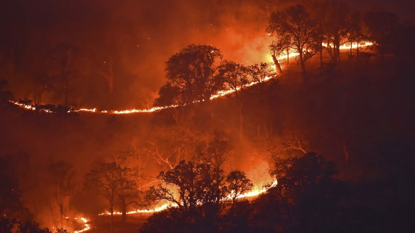 Spot fires burn on a hillside caused by a lightning strike along Marsh Creek Road in Brentwood, Calif., on Monday, Aug. 17, 2020. California firefighters battled destructive wildfires Monday as a lengthening heat wave roasted the state. (Jose Carlos Fajardo/Bay Area News Group via AP)