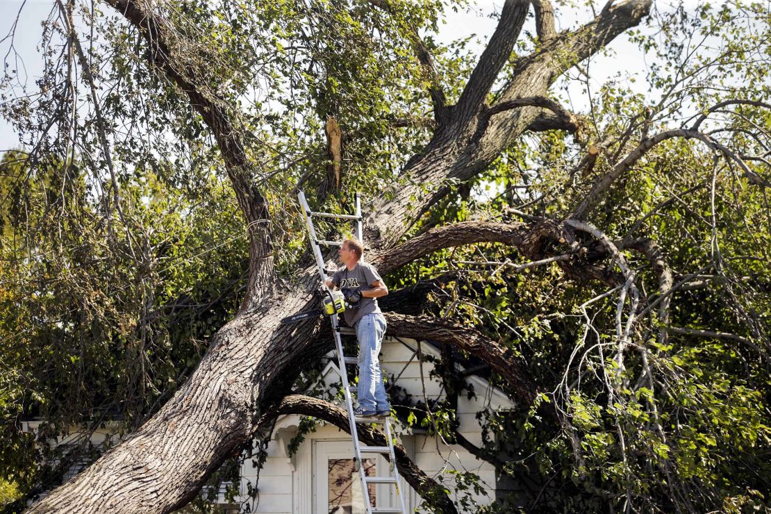 Work continues on tree and debris removal in Cedar Rapids, Iowa, on Saturday.