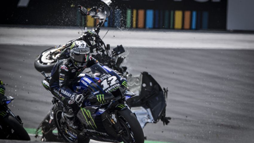 Maverick Vinales narrowly misses flying bike