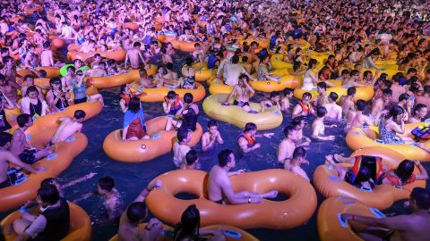 Thousands of revelers gathered at an open air water park in the Chinese city of Wuhan, ground zero of the pandemic, for an electronic music festival in August.