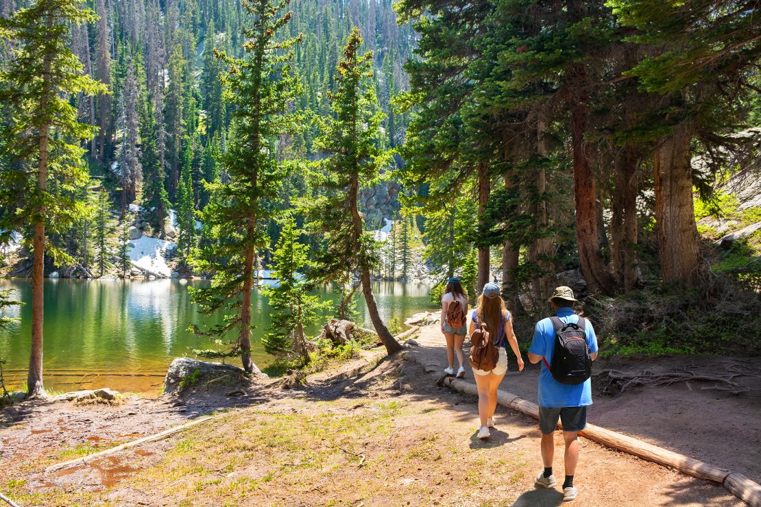 Take a cue from thise people hiking on Emerald Lake Trail in Rocky Mountains National Park in Colorado. A brisk walk could help change your outlook.