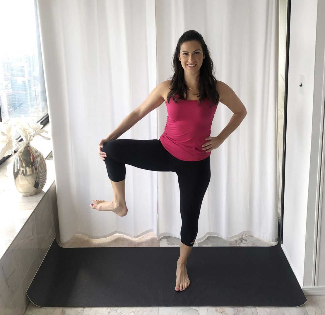 Placeit - Leggings Mockup of a Woman Doing a Warrior Three Yoga Pose