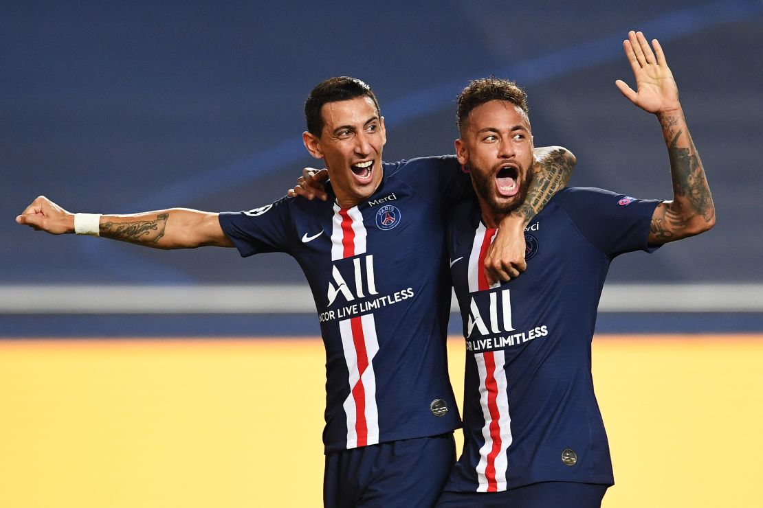 Angel Di Maria celebrates with Neymar after doubling PSG's lead.