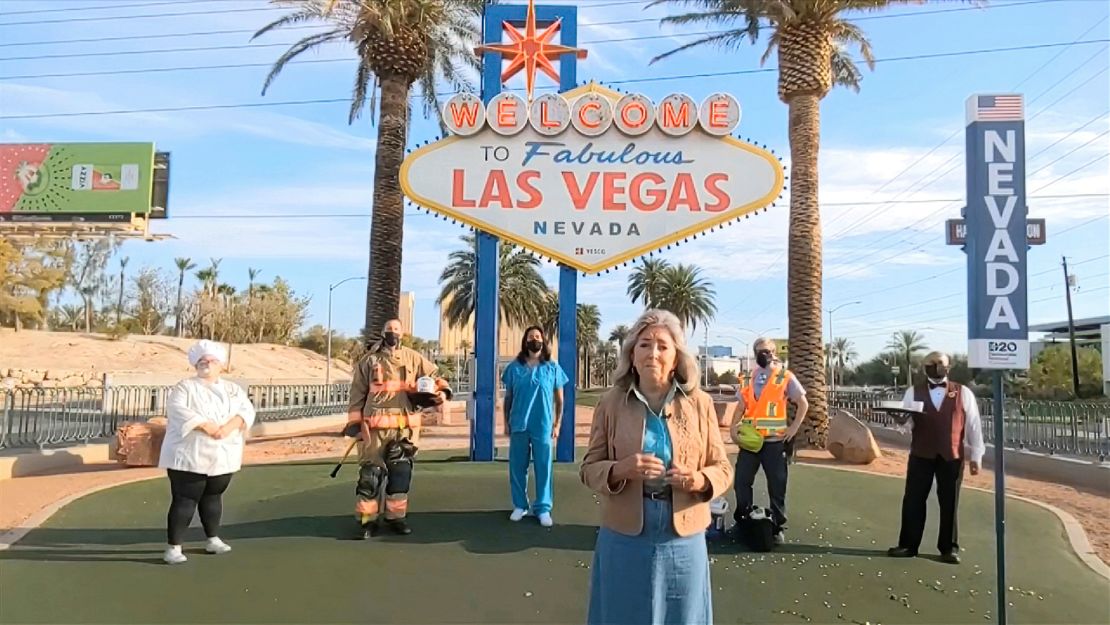 US Representative Dina Titus addresses the DNC in fron of the famous "Welcome to Las Vegas" sign.