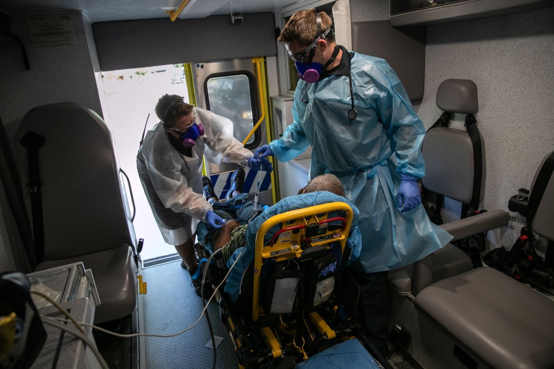 Medics transport a man with possible Covid-19 symptoms to the hospital on August 7 in Austin, Texas. African Americans continue to be disproportionally affected by the coronavirus pandemic. 
