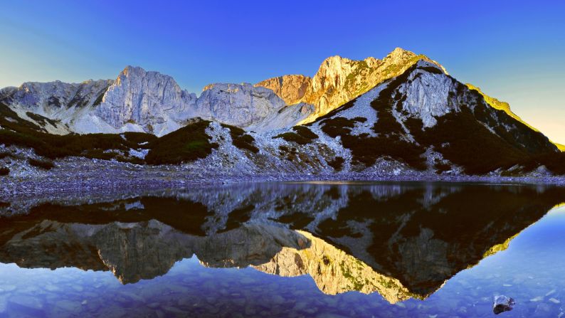 <strong>Pirin National Park:</strong> Mount Sinanitca is reflected in the calm waters of Sinanitca Lake. 