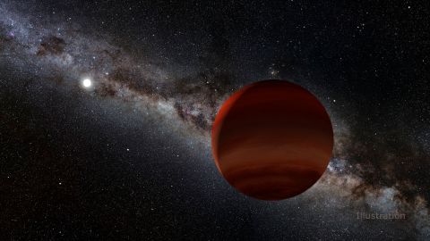 This artist's concept shows a brown dwarf, which is neither a planet nor a star, and a white dwarf, or dead star, in the distance.