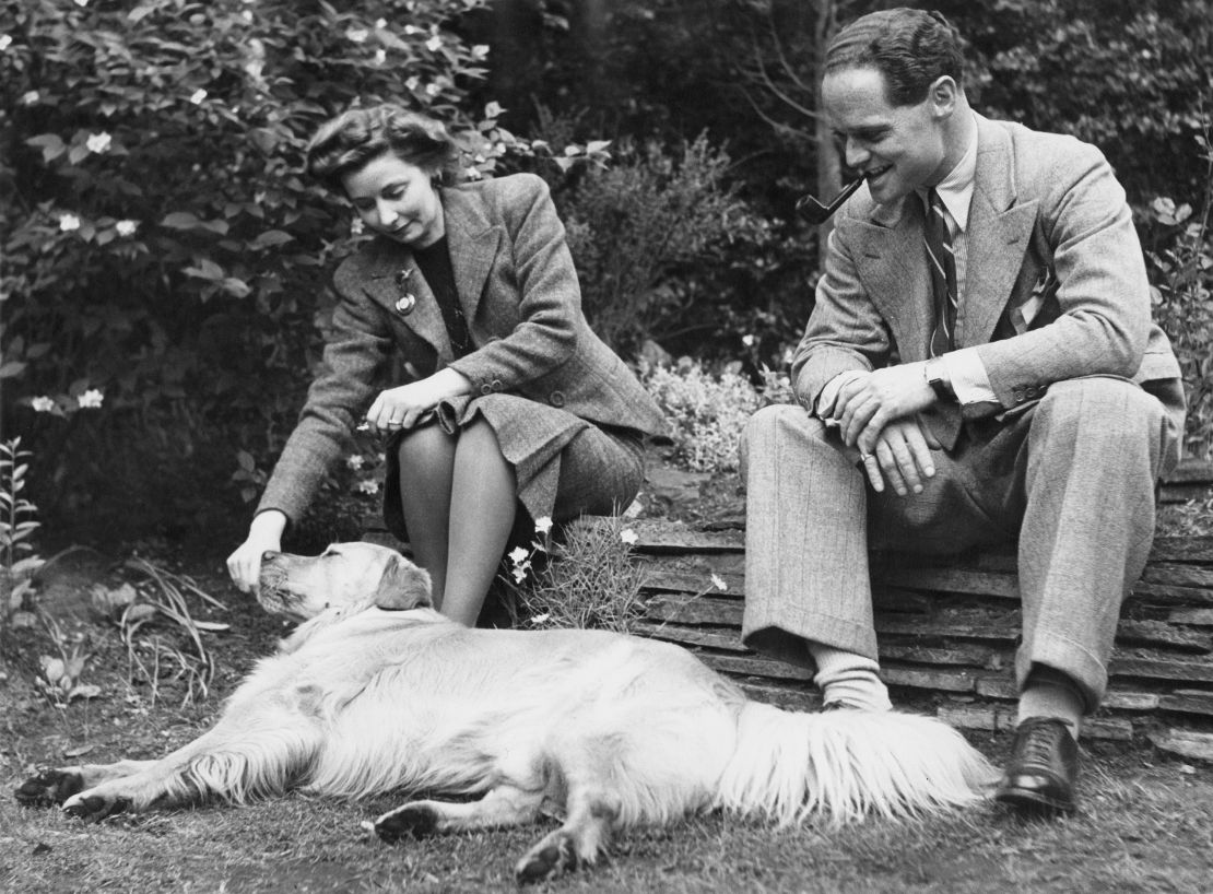 RAF flying ace Douglas Bader  in the garden of his home in Ascot, Berkshire, with his wife, Thelma, after his release from a German prisoner-of-war camp in 1945. 