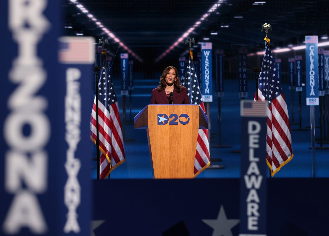 Harris delivers her speech Wednesday from the Chase Center in Wilmington. She is the first Black and South Asian woman to be nominated to a major party's ticket. "Years from now," she said, "this moment will have passed, and our children and our grandchildren will look in our eyes and they're going to ask us, 'Where were you when the stakes were so high?' ... We will tell them not just how we felt, we will tell them what we did."