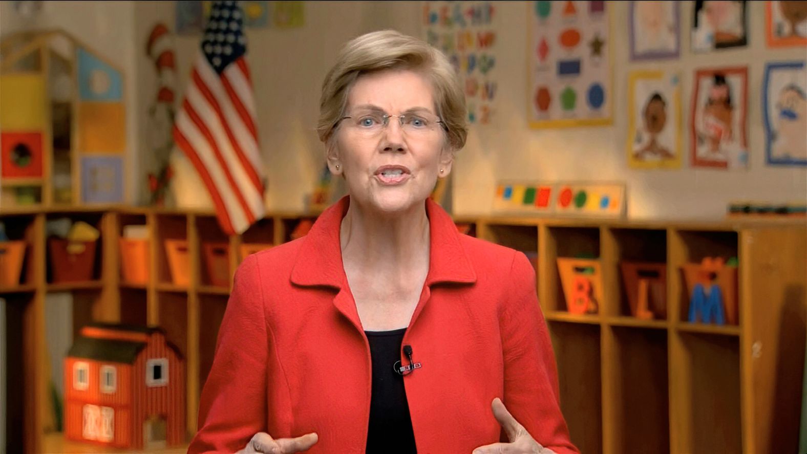 US Sen. Elizabeth Warren spoke from a pre-K and kindergarten facility that has been shuttered because of the coronavirus pandemic. <a href="index.php?page=&url=https%3A%2F%2Fwww.cnn.com%2Fpolitics%2Flive-news%2Fdnc-2020-day-3%2Fh_3236105cc23b6c09a74f619916344a83" target="_blank">She focused her remarks on child care,</a> an issue that has grown in prominence these last few months as parents struggle to balance work and caring for their children. At right, the letters "BLM" are seen — <a href="index.php?page=&url=https%3A%2F%2Fwww.cnn.com%2F2020%2F08%2F19%2Fpolitics%2Felizabeth-warren-blm-blocks-black-lives-matter-dnc%2Findex.html" target="_blank">a subtle tribute to the Black Lives Matter movement.</a>