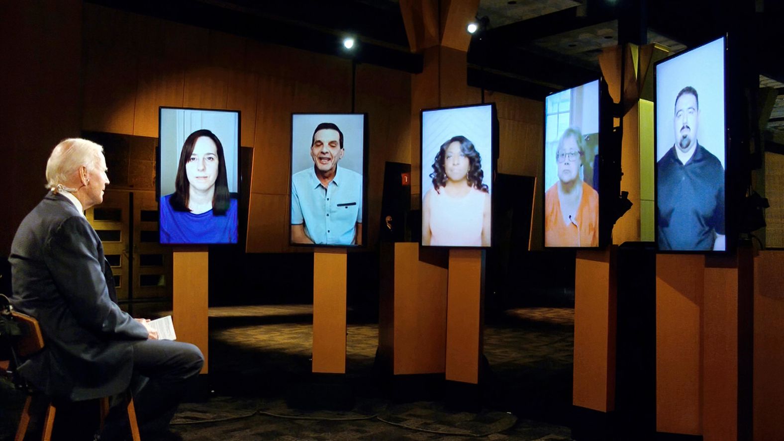 Biden leads a conversation about health care during a segment on Tuesday. Among those joining Biden were a doctor, a paramedic and two nurses on the front lines of the coronavirus pandemic.