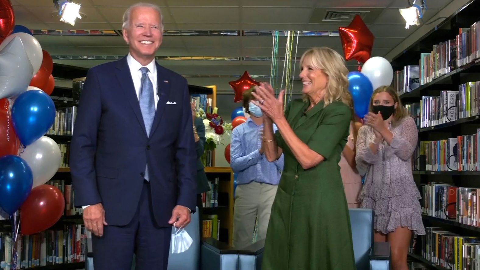 Jill Biden claps for her husband after he <a href="index.php?page=&url=https%3A%2F%2Fwww.cnn.com%2Fpolitics%2Flive-news%2Fdnc-2020-day-2%2Fh_b715ace734f88da814b7afb7733471d9" target="_blank">was officially nominated </a>on Tuesday.  His grandchildren shot celebratory streamers behind him. "Thank you all from the bottom of my heart from my family, and I'll see you on Thursday," Biden said, referring to his upcoming speech to close the convention.