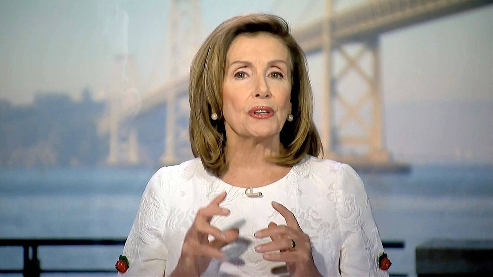 House Speaker Nancy Pelosi delivers remarks on Wednesday. "As speaker, I've seen firsthand Donald Trump's disrespect for facts, for working families, and for women in particular — disrespect written into his policies toward our health and our rights, not just his conduct," she said.