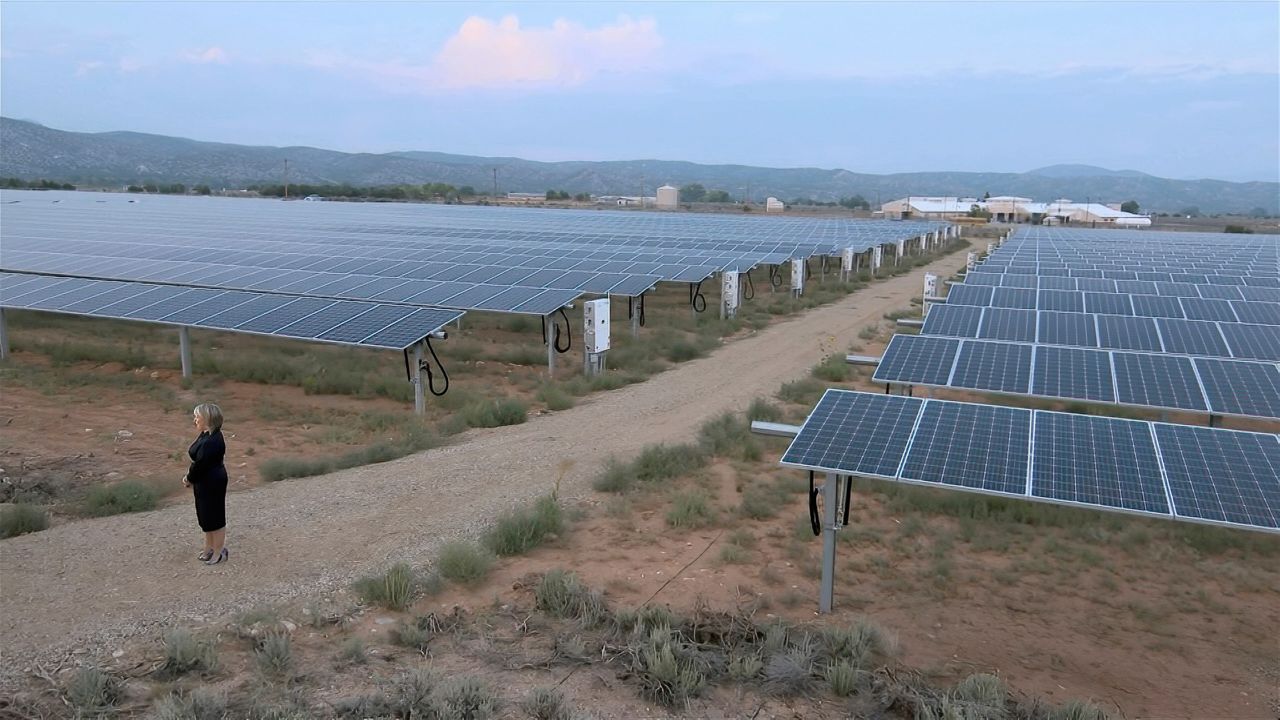 New Mexico Gov. Michelle Lujan Grisham speaks in front of solar panels as she <a href="https://www.cnn.com/politics/live-news/dnc-2020-day-3/h_b25d2470a9dd3beb6b5dd456d347a6c6" target="_blank">addresses climate change.</a> Lujan Grisham, who interviewed to be Biden's running mate, said Biden would rejoin the Paris climate agreement if he is elected president and "invest in clean energy jobs."