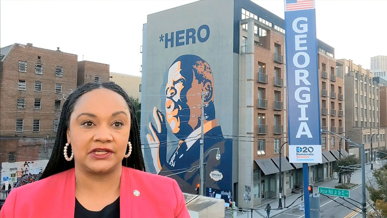 Georgia state Sen. Nikema Williams speaks in front of a mural of the late <a href="http://www.cnn.com/2020/02/20/politics/gallery/john-lewis/index.html" target="_blank">Rep. John Lewis</a> on Tuesday.
