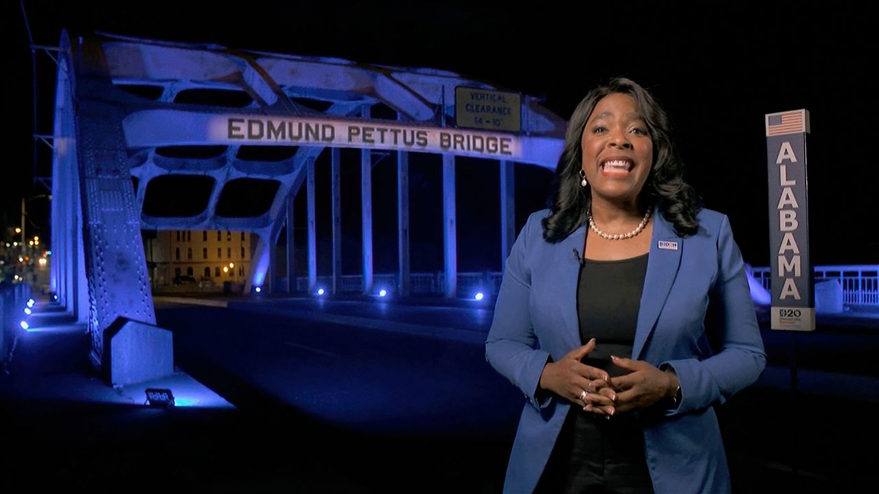 US Rep. Terri Sewell participates in the roll call in front of the historic Edmund Pettus Bridge in Selma, Alabama.