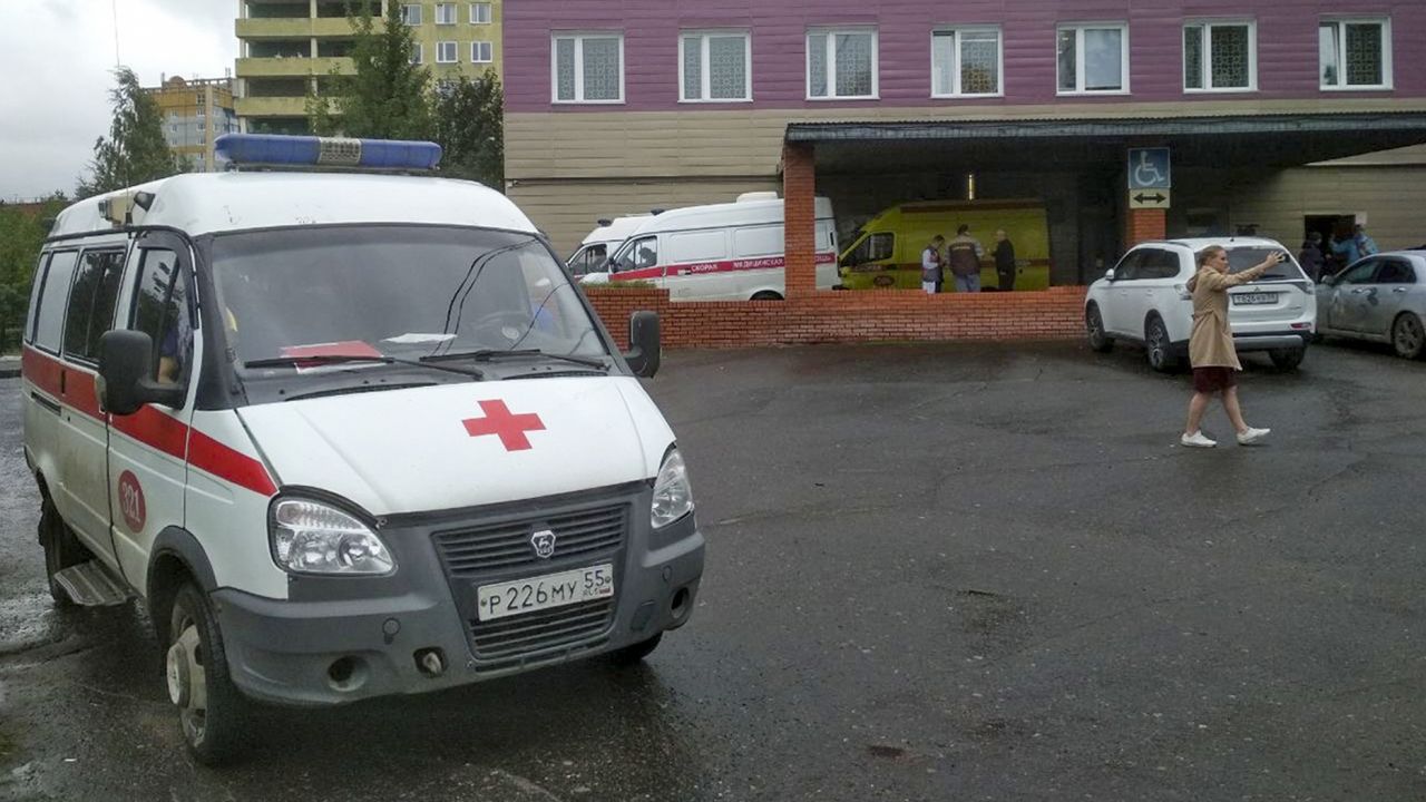 An ambulance parked next to a building of a hospital intensive care unit where Navalny was hospitalized in Omsk, Russia.