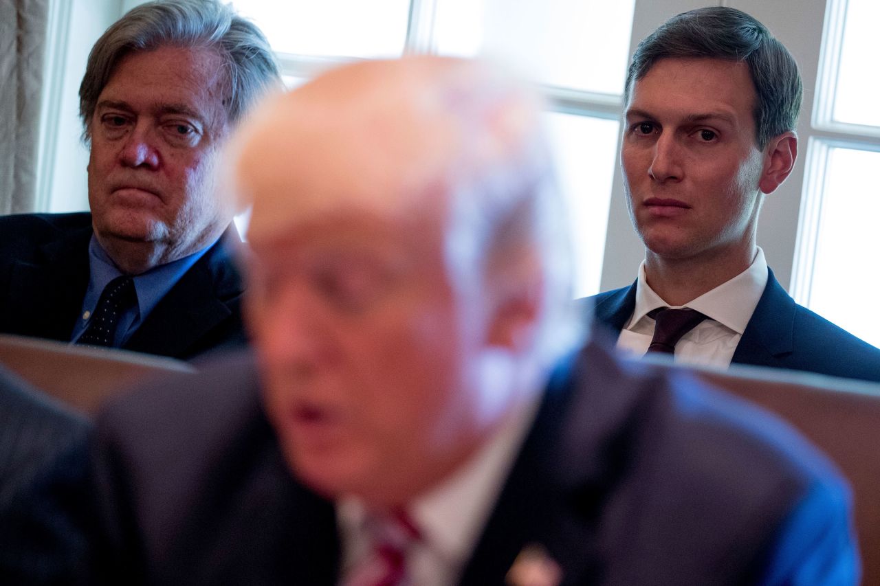 Bannon and Kushner listen as Trump speaks during a Cabinet meeting in June 2017.