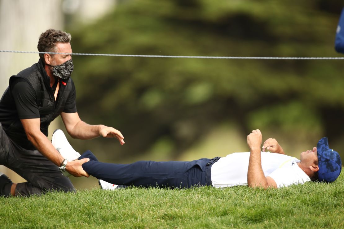Koepka receives treatment on day two of the 2020 PGA Championship.