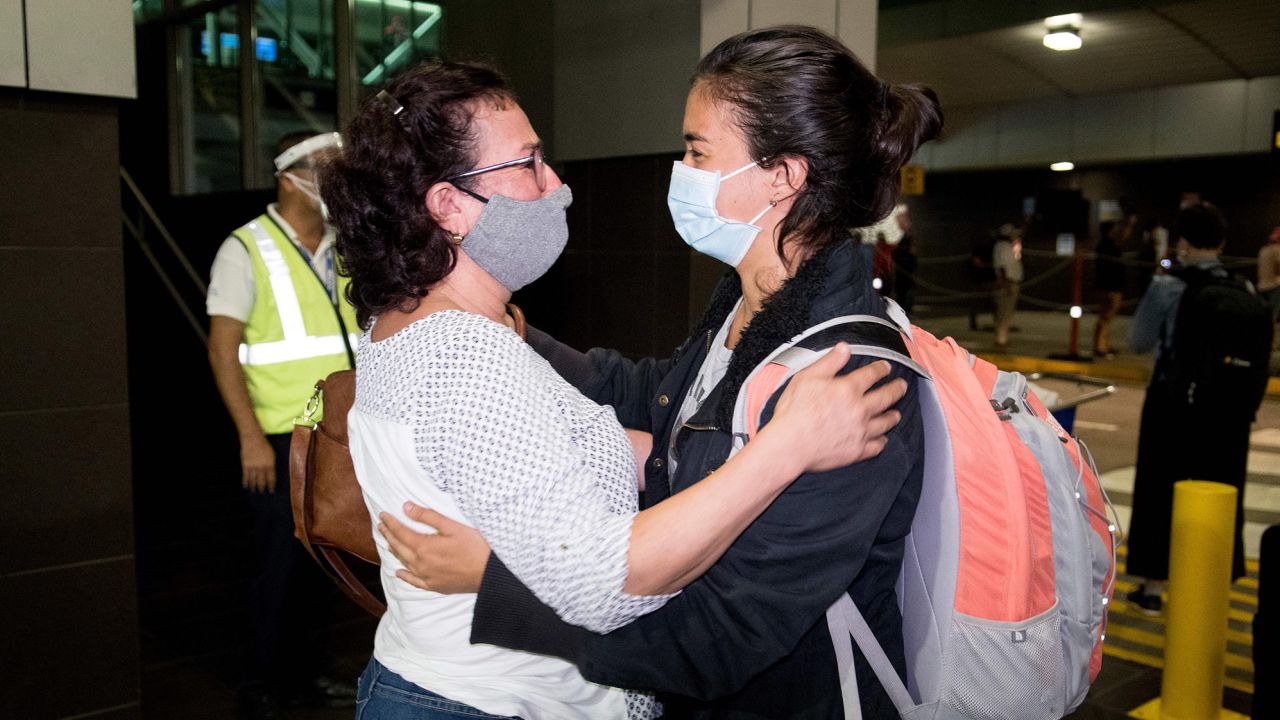People arrive at Juan Santamaria International Airport in San Jose, Costa Rica, August 3, 2020, amid the coronavirus pandemic.