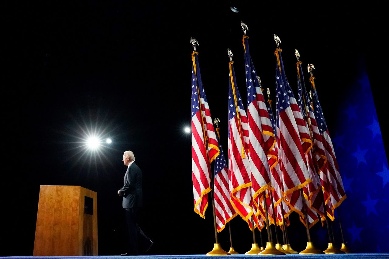Biden arrives on stage for his acceptance speech.