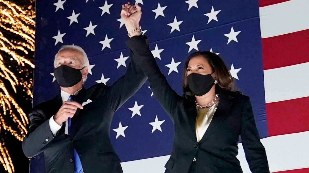 Democratic presidential candidate former Vice President Joe Biden and his running mate Sen. Kamala Harris, D-Calif., watch fireworks during the fourth day of the Democratic National Convention, Thursday, Aug. 20, 2020, at the Chase Center in Wilmington, Del. (AP Photo/Andrew Harnik)