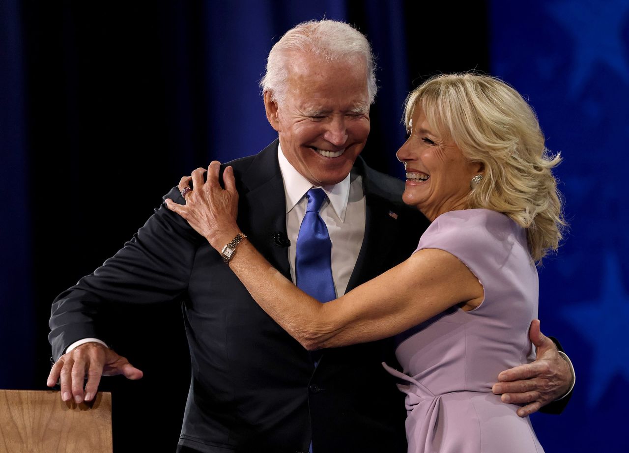 The Bidens embrace immediately after his speech on Thursday.