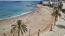 Border-closures----Figueretas-beach,-Ibiza,-Spain---Getty-Images