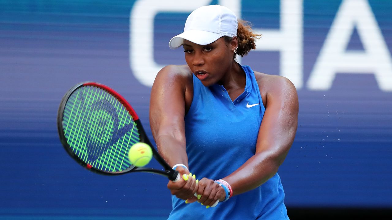 Townsend returns a shot against Simona Halep at last year's US Open.